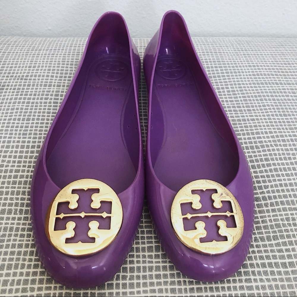 Purple Tory Burch jelly flats with gold logo